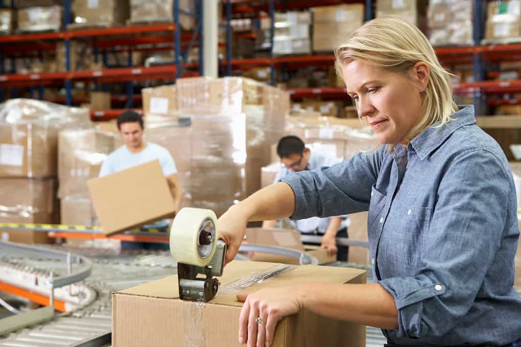 workers packing an order for order fulfillment 